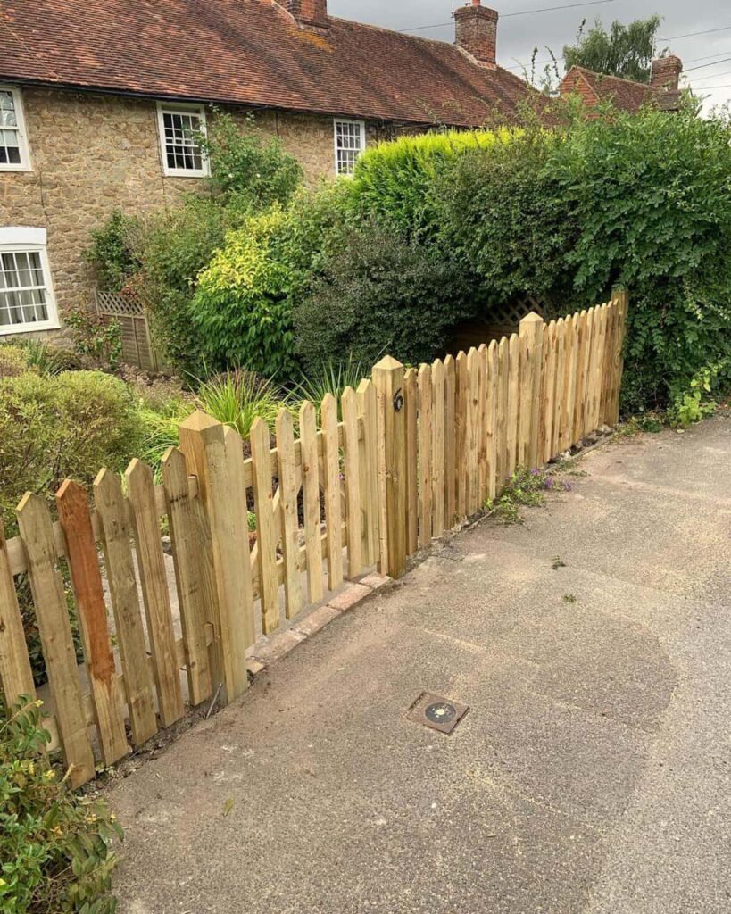 This is a photo of a picket fence and picket gate installed by Fast Fix Fencing Gravesend